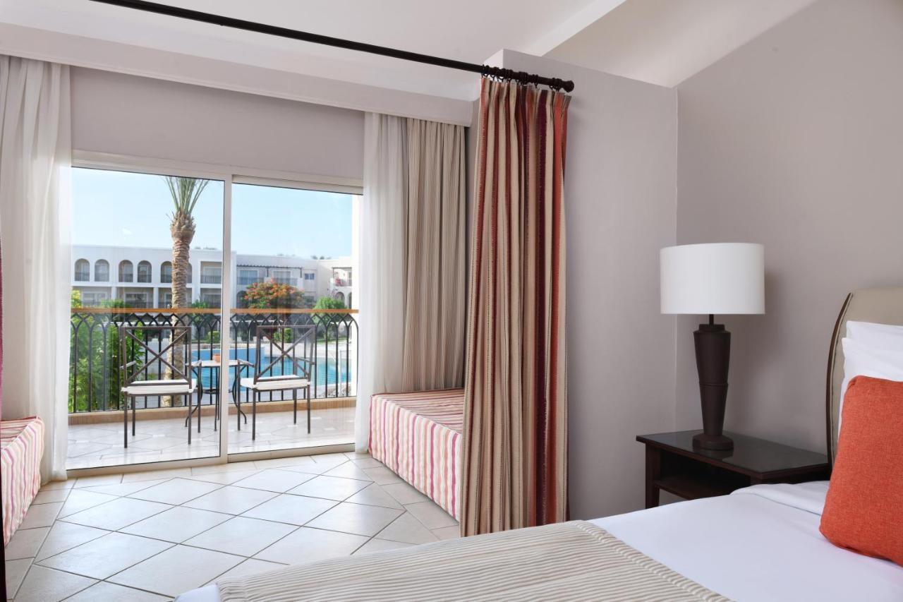 Jaz Mirabel Resort Sharm el Sheikh Esterno foto A room at the hotel