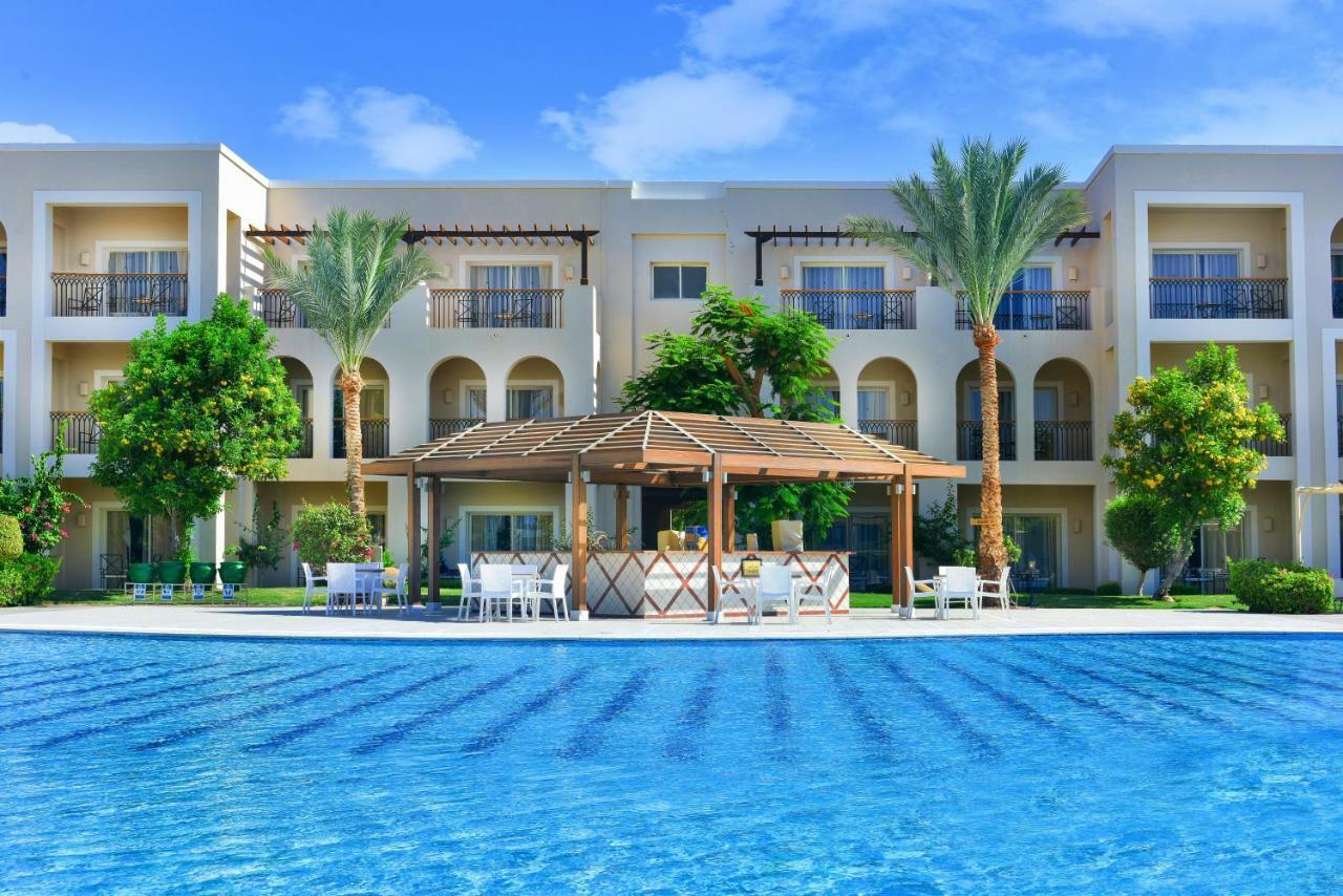 Jaz Mirabel Resort Sharm el Sheikh Esterno foto The swimming pool at the resort