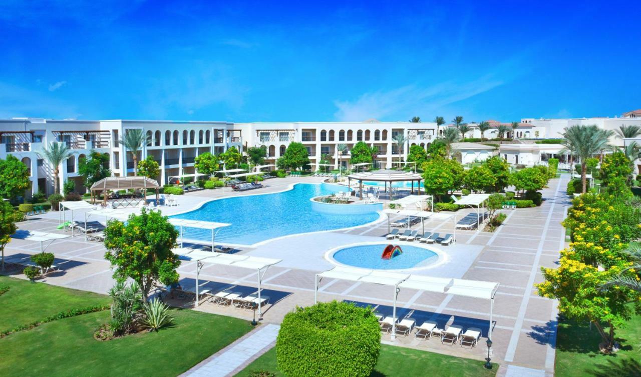 Jaz Mirabel Resort Sharm el Sheikh Esterno foto The swimming pool at the resort
